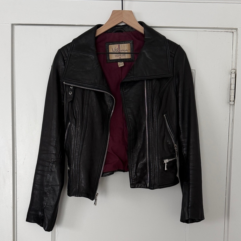 Wilsons Leather Black Leather Moto Jacket with Wine Interior in Size XS